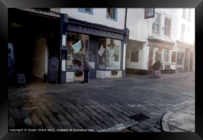 Whitby street and shops Framed Print by Stuart Chard