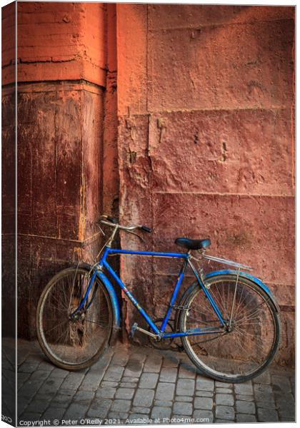 The Blue Bike Canvas Print by Peter O'Reilly