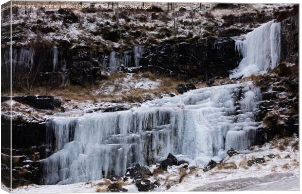 Frozen waterfall at the Brecon Beacons, South Wales, UK. Canvas Print by Andrew Bartlett