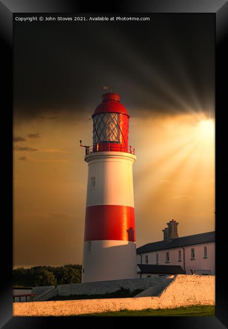 Lighthouse at Sunset Framed Print by John Stoves