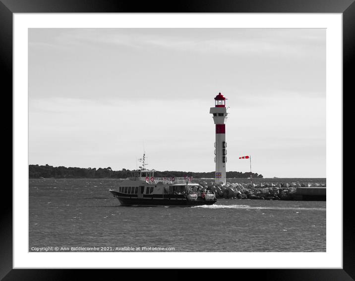 Cannes ferry to the islands in monochrome with red Framed Mounted Print by Ann Biddlecombe