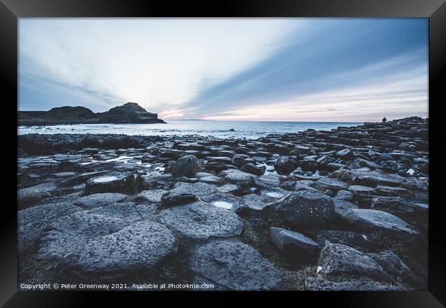 The Basalt Columns At The Giants Causeway At Sunse Framed Print by Peter Greenway