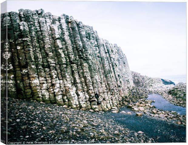 The Basalt Columns At The Giant's Causeway At Suns Canvas Print by Peter Greenway