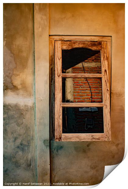 A wooden window on yellow brown wall. Print by Hanif Setiawan