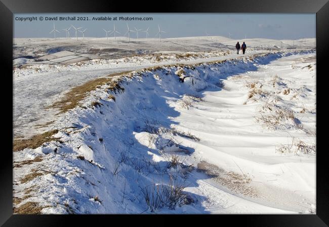 Pennine snowscene at Blackstone Edge. Framed Print by David Birchall