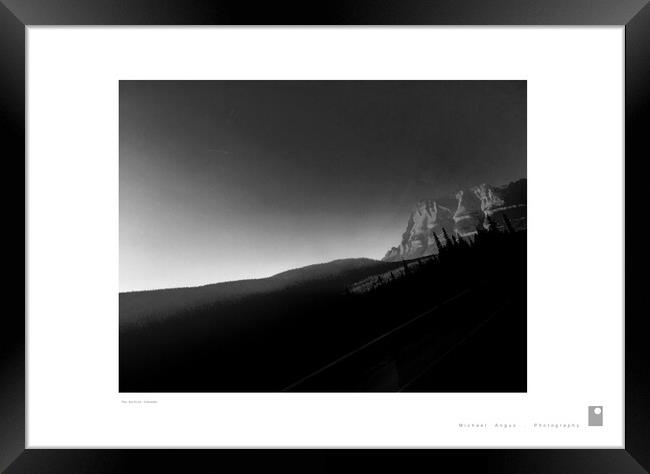 The Rockies (Canada) Framed Print by Michael Angus