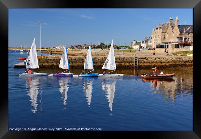 Dinghies returning to Findhorn harbour, Scotland Framed Print by Angus McComiskey