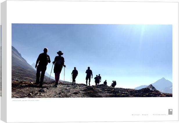 Trekking Friends: Lake Helen (Rockies) Canvas Print by Michael Angus