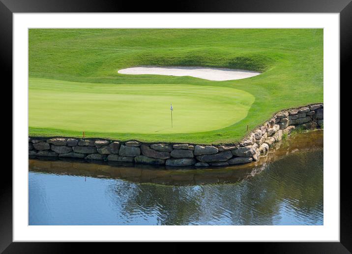 Challenging hole on luxury golf course with water and sand Framed Mounted Print by Steve Heap