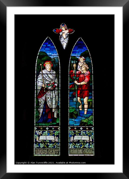 Indoor church stained glass window Framed Mounted Print by Alan Tunnicliffe