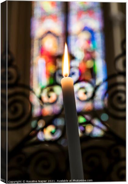Candle and stained glass window Canvas Print by Rosaline Napier