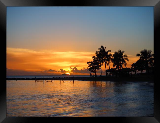 Captivating St Lucia Sunset Framed Print by Tommy Dickson