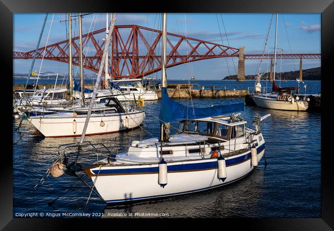 Yachts moored in South Queensferry harbour Framed Print by Angus McComiskey