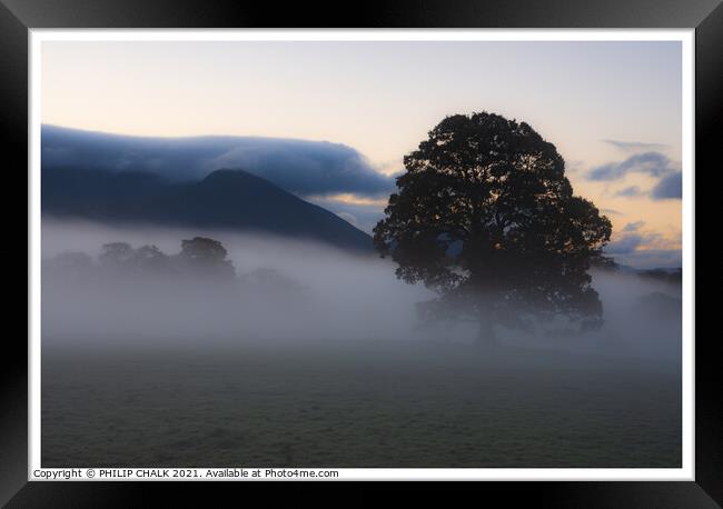 Misty meadow in the lake district (Cumbria) Framed Print by PHILIP CHALK