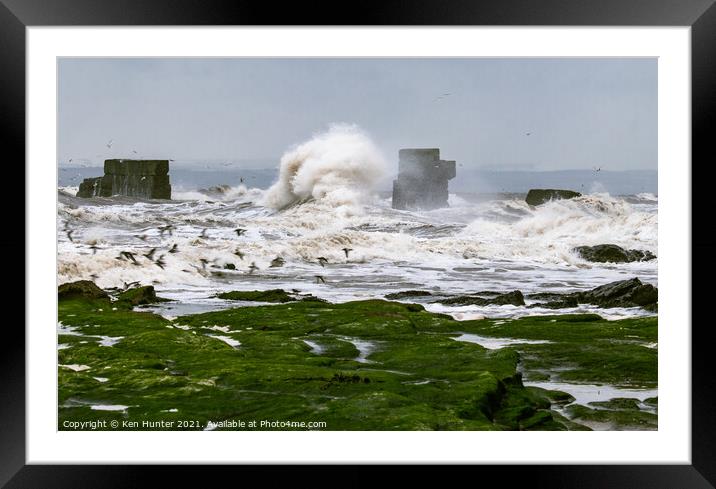 Old Sea Wall Braving Towering Wave  Framed Mounted Print by Ken Hunter