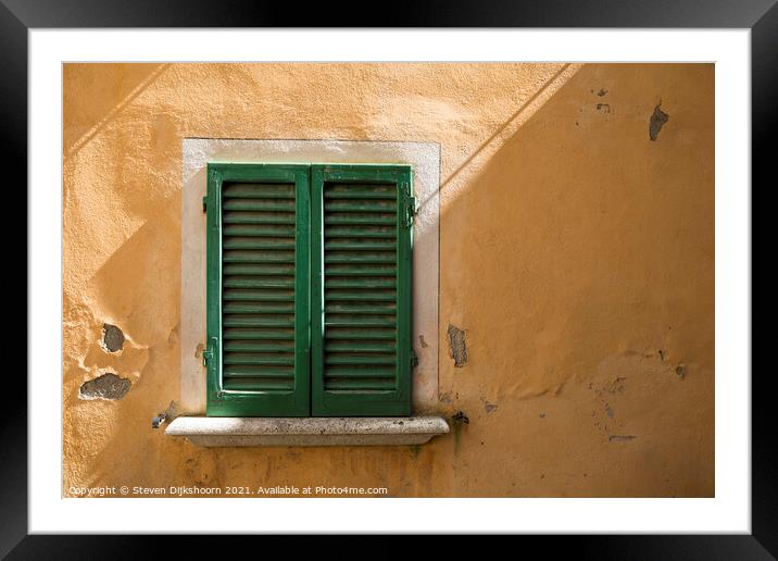 Green shutters and a yellow concrete wall in Italy Framed Mounted Print by Steven Dijkshoorn
