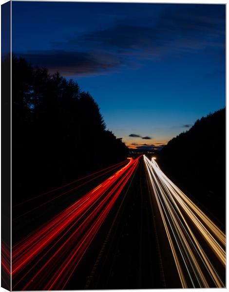 Motorway Light Trails. Canvas Print by Tommy Dickson