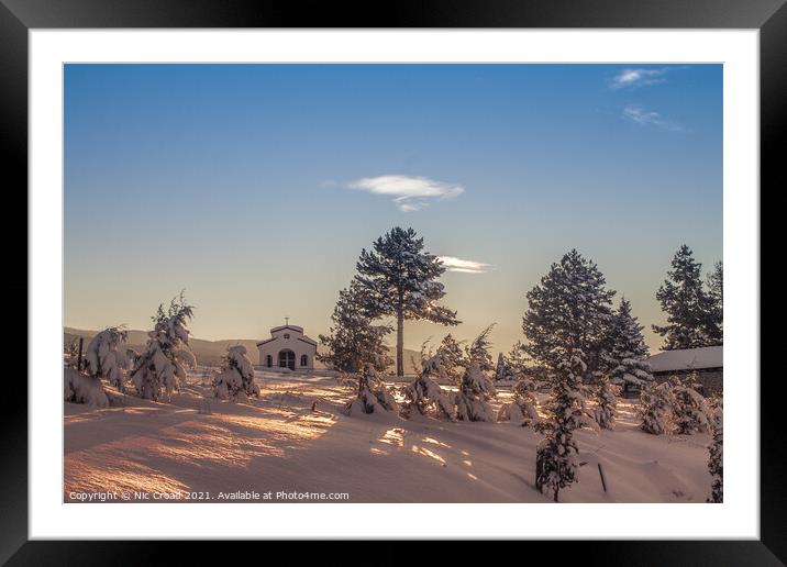 Greek Church in the snow Framed Mounted Print by Nic Croad