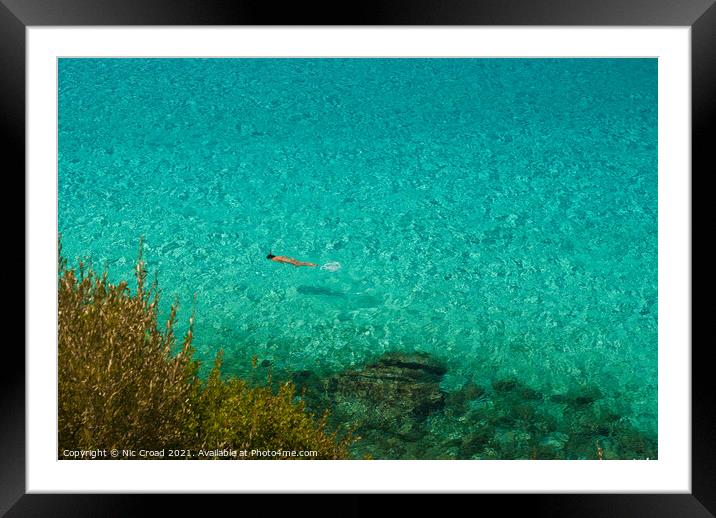 Swimming in the crystal clear sea, Halkidiki, Gree Framed Mounted Print by Nic Croad
