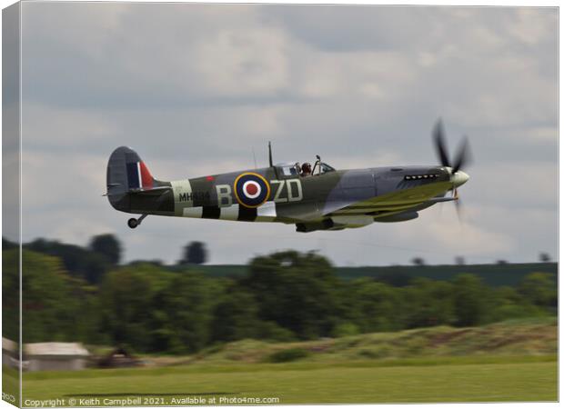 Low level RAF Spitfire Canvas Print by Keith Campbell