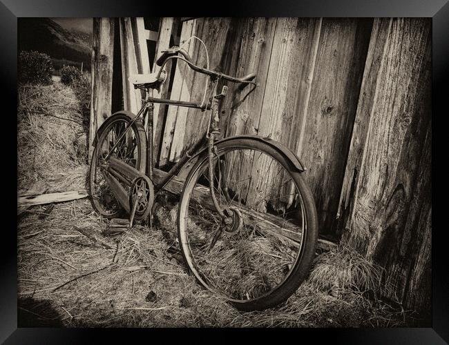 Abandoned bicycle. Framed Print by Tommy Dickson
