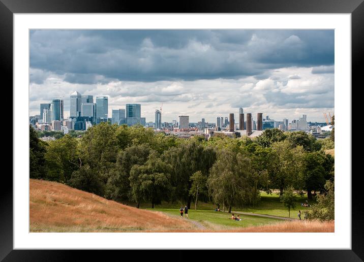 Canary Wharf tall buildings from Greenwich park Framed Mounted Print by tim miller