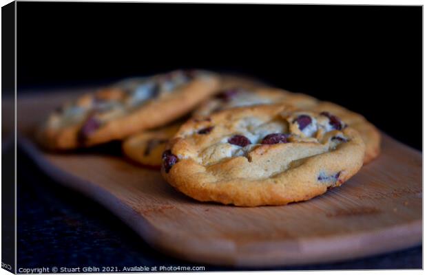 Freshly baked chocolate chip cookies Canvas Print by Stuart Giblin