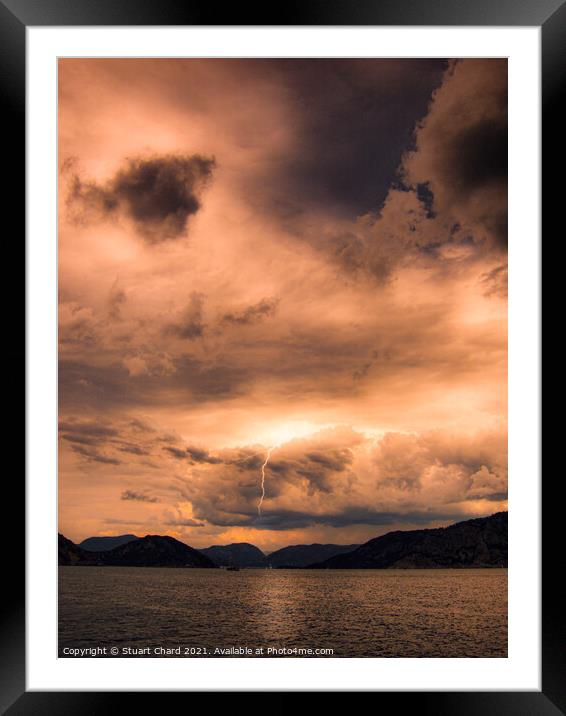 Storm clouds and lightning at sea Framed Mounted Print by Travel and Pixels 