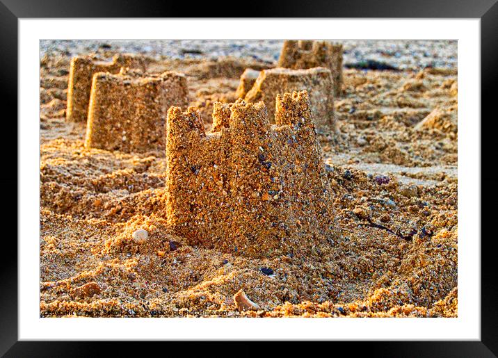 Sandcastles on the beach at Thorpe Bay, Southend on Sea, Essex. Framed Mounted Print by Peter Bolton