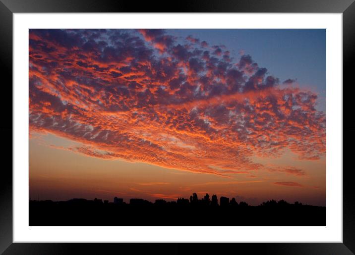 Unusual cloud formation. Early morning at Westclif Framed Mounted Print by Peter Bolton