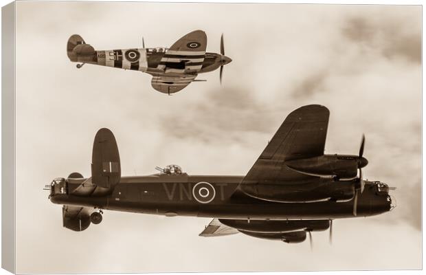 Lancaster escorted by a Spitfire Canvas Print by Jason Wells