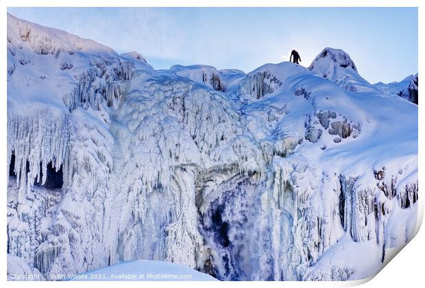 The figure of a person on the top of the frozen Chutes de Chaudière at Charny near Quebec City, Canada Print by Colin Woods