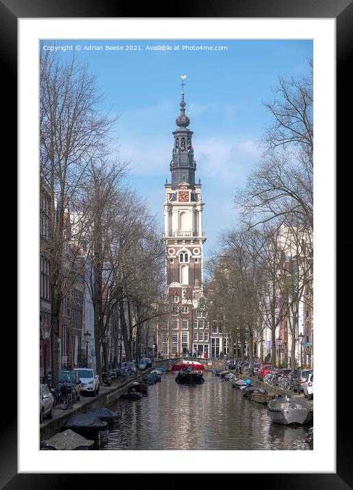 Ornate Church Clocktower at the end of a canal in Amsterdam Framed Mounted Print by Adrian Beese