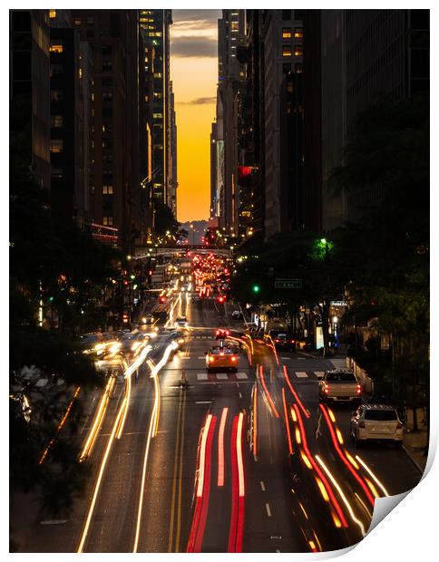 Manhattanhenge when the sun sets along 42nd street in NY Print by Steve Heap