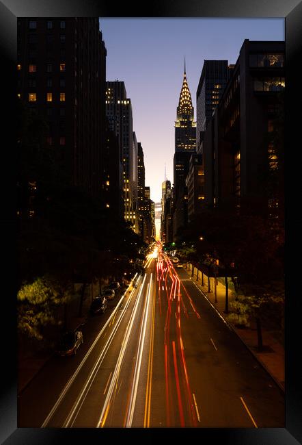 Manhattanhenge when the sun sets along 42nd street in NY Framed Print by Steve Heap