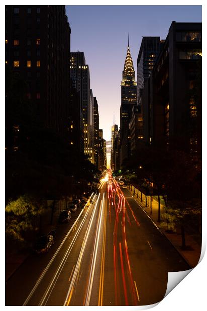 Manhattanhenge when the sun sets along 42nd street in NY Print by Steve Heap