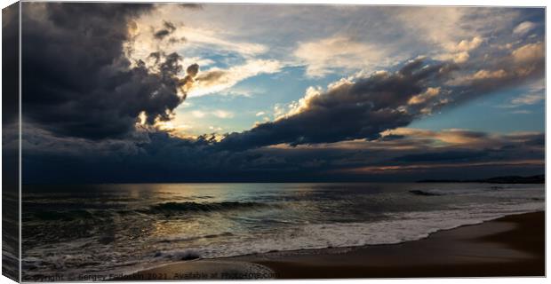 Coast of a sea and dramatic sky. Evening time.  Canvas Print by Sergey Fedoskin