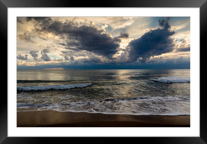 Coast of a sea and dramatic sky. Evening time.  Framed Mounted Print by Sergey Fedoskin