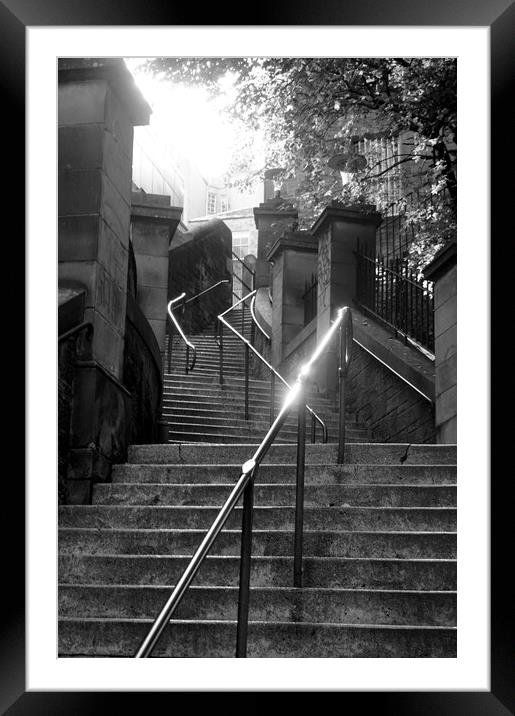 Sun shining on stairway railing Framed Mounted Print by Theo Spanellis