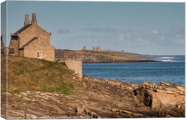 Howick Bathing House and Dunstanburgh Castle Canvas Print by Richard Laidler