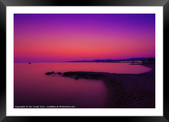 Beach Sunset with vivid Afterglow Framed Mounted Print by Nic Croad