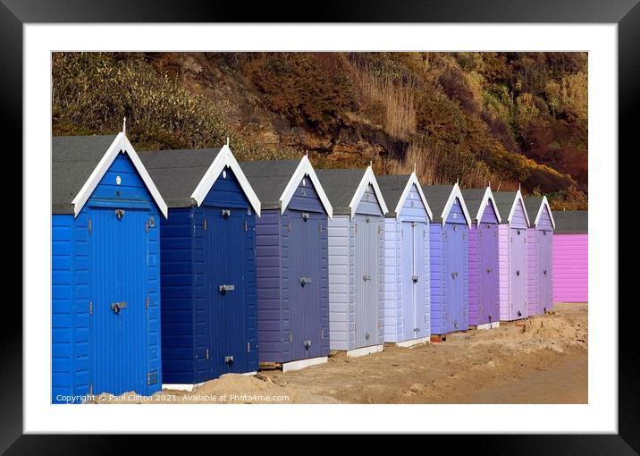 Bournemouth beach huts in harmony. Framed Mounted Print by Paul Clifton