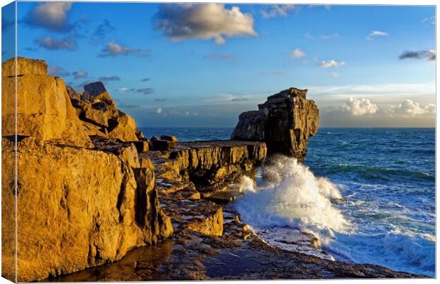 Pulpit Rock and stormy seas Canvas Print by Darren Galpin
