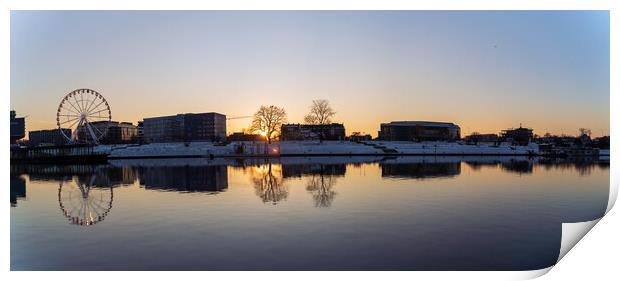 Krakow, Poland - January 31, 2021: Panoramic shot of Cracow cityscape, Ferris wheel and polish architecture next to Vistula river during sunset in Winter. Print by Arpan Bhatia