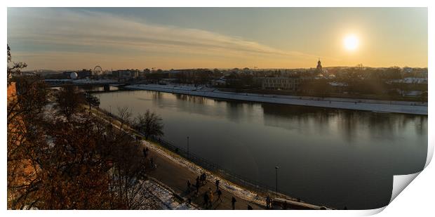 Krakow, Poland - January 31, 2021: Panorama aerial shot of Cracow cityscape next to Vistula river during sunset in Winter with people doing leisure. Print by Arpan Bhatia