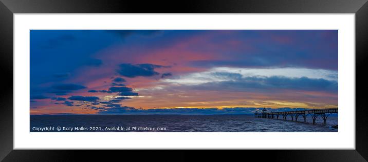 Clevedon Pier at sunset on a cloudy evening Framed Mounted Print by Rory Hailes