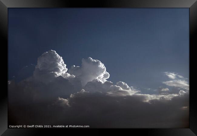 White Cumulonimbus Cloud in Blue Sky Framed Print by Geoff Childs
