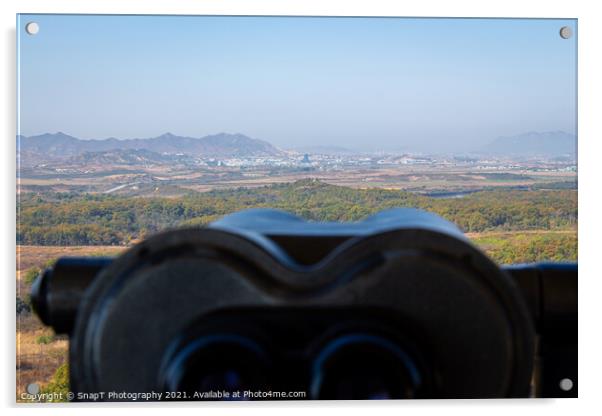 A view into North Korea across the DMZ from South Korea, from behind binoculars Acrylic by SnapT Photography