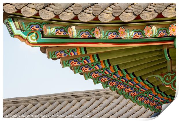 Traditional Korean roof architecture on a building in Seoul, South Korea Print by SnapT Photography