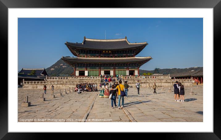 Tourists at the entrance to Gyeongbokgung Palace on a fall day in Seoul Framed Mounted Print by SnapT Photography
